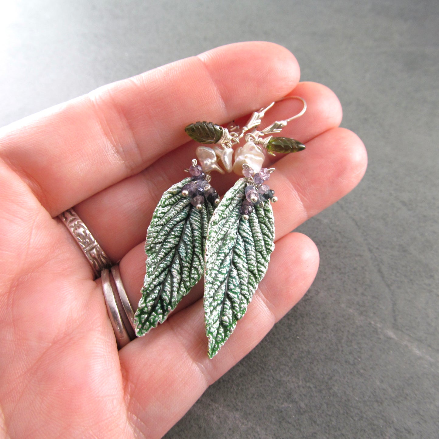 Green leaf earrings with enamel, purple sapphires, pearl and vesuvianite