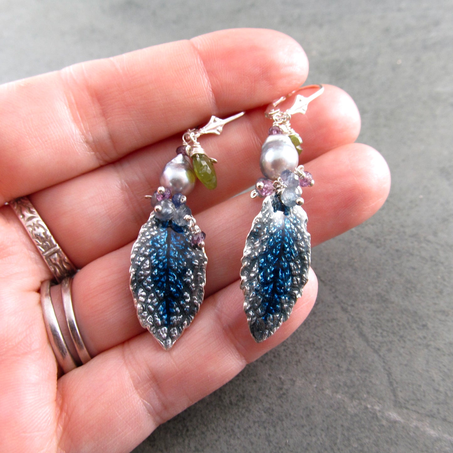 Blue enameled fine silver leaf earrings, with blue Akoya pearls, sapphire, vesuvianite leaves