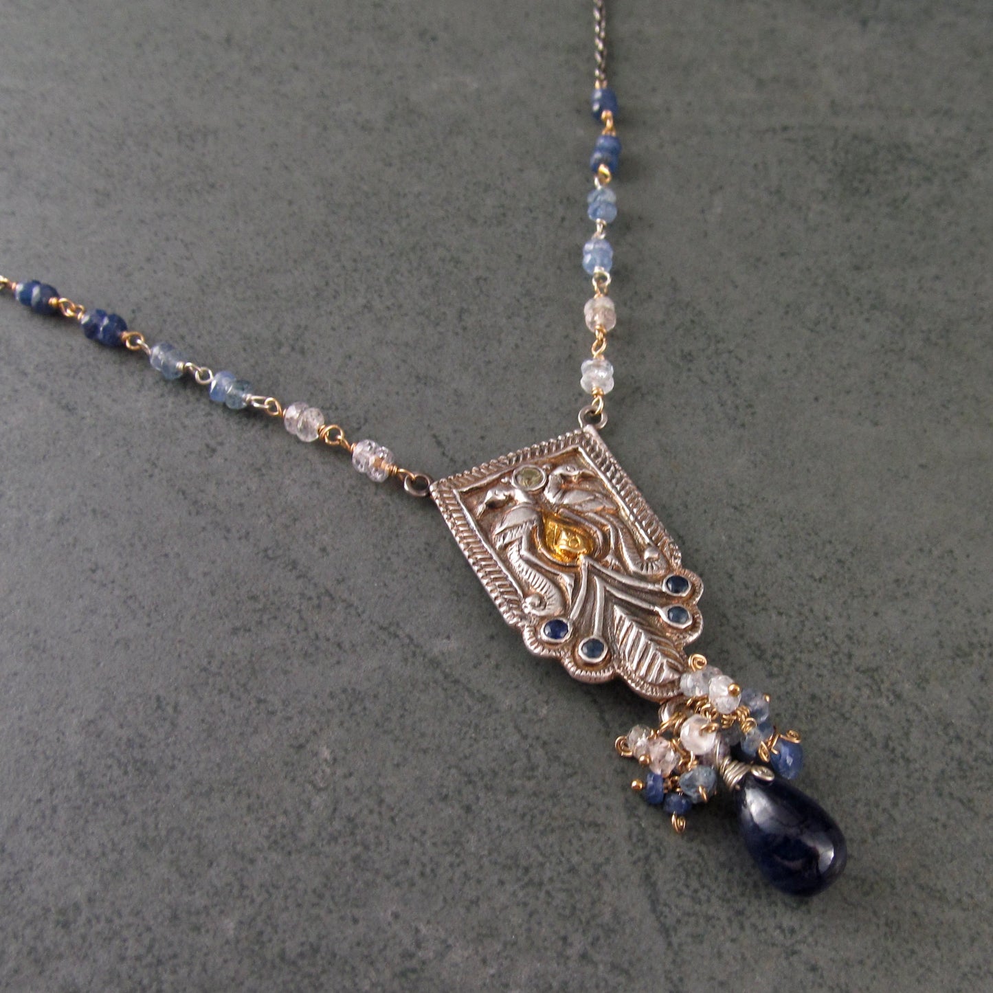 Sapphire peacock necklace in fine silver with 22k gold accents