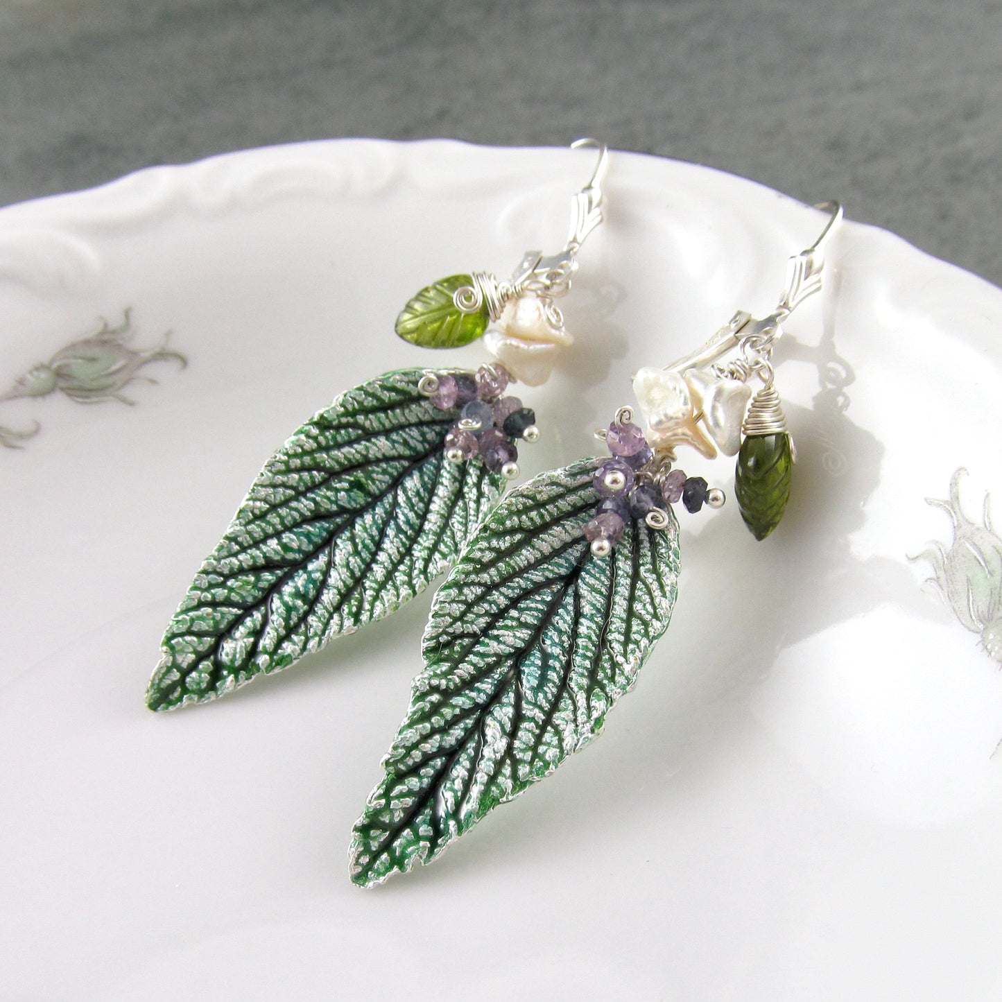Green leaf earrings with enamel, purple sapphires, pearl and vesuvianite