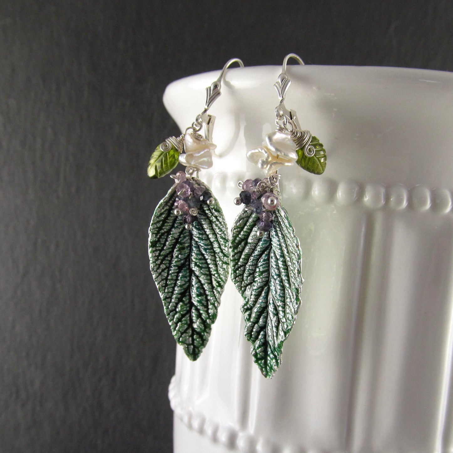 Green leaf earrings with enamel, purple sapphires, pearl and vesuvianite