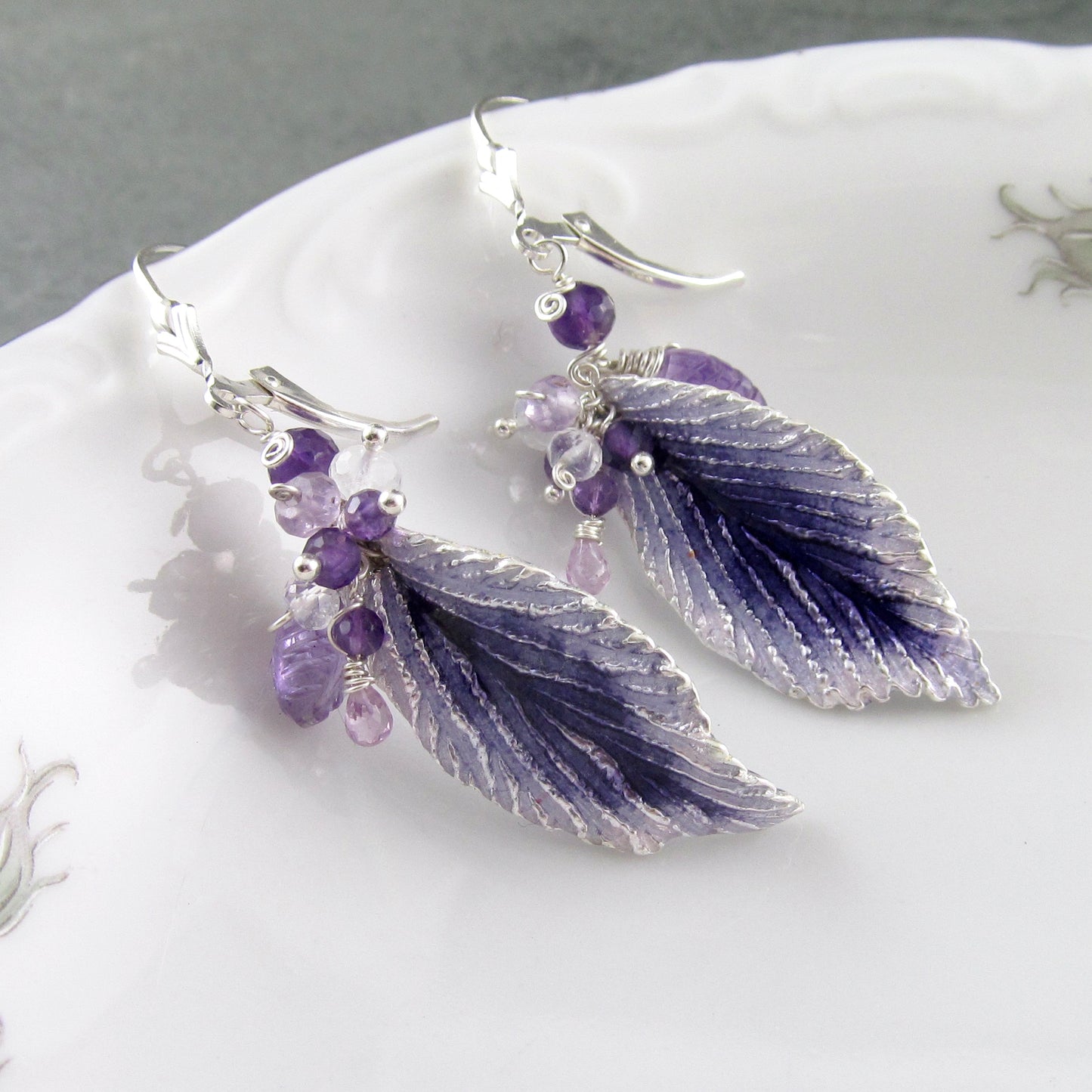 Purple enamel leaf earrings in fine silver with amethyst, moonstone and lavender sapphire