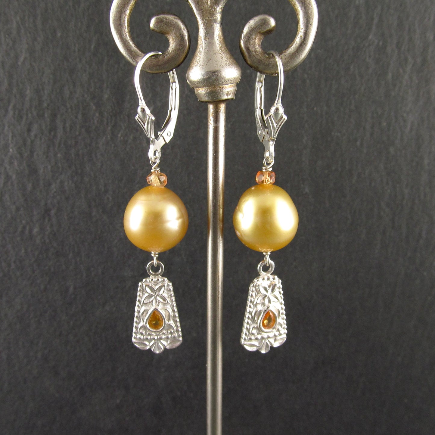 Gold South Sea pearl earrings with orange sapphire in fine silver