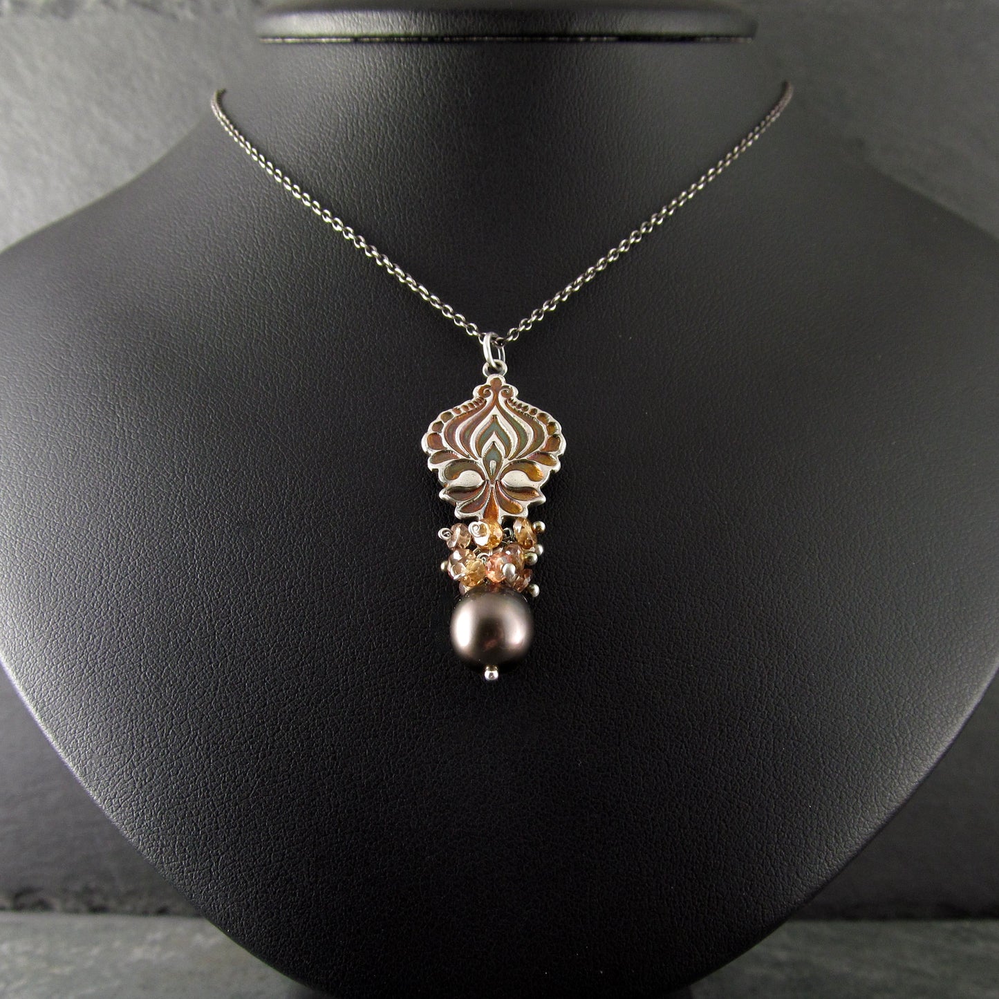 Mocha Tahitian Pearl pendant in fine silver with color change garnets