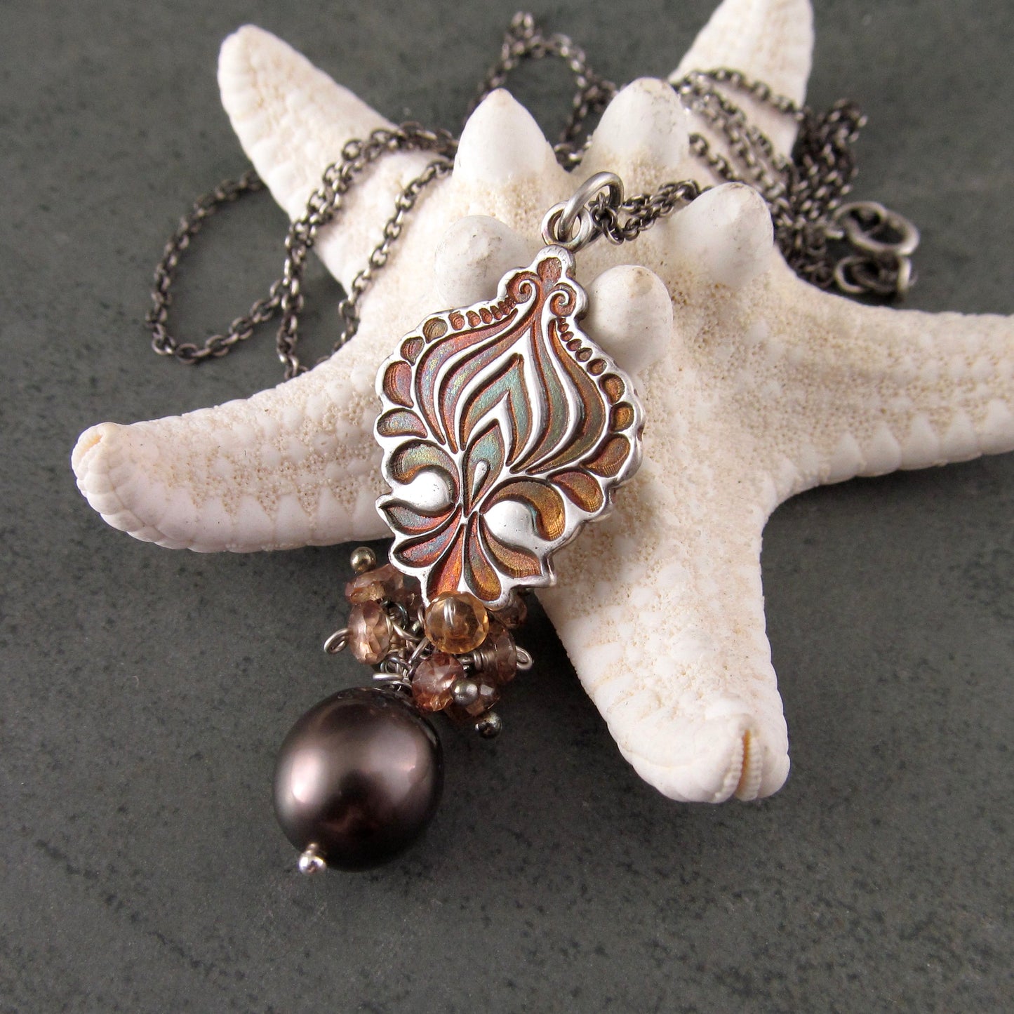 Mocha Tahitian Pearl pendant in fine silver with color change garnets