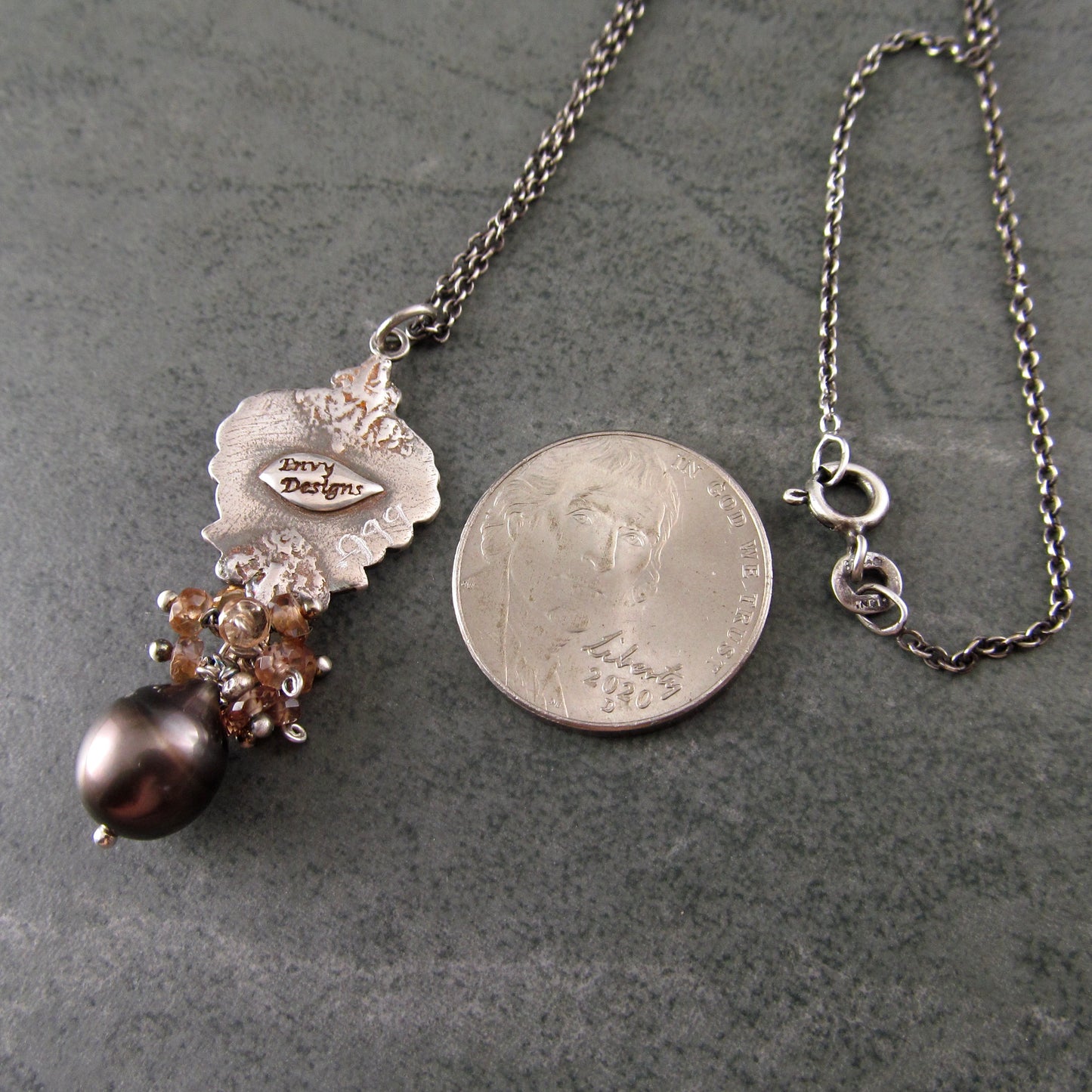 Mocha Tahitian Pearl pendant in fine silver with color change garnets