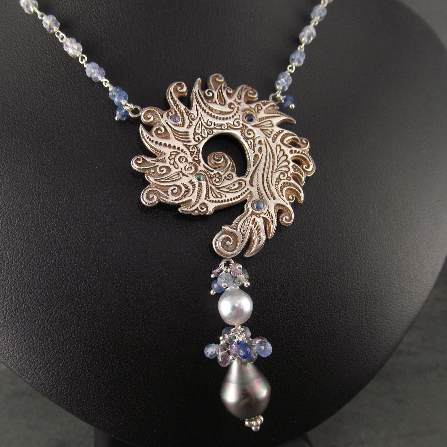 Ocean blue spiral shell fine silver pendant with sapphire and Tahitian and Akoya pearls