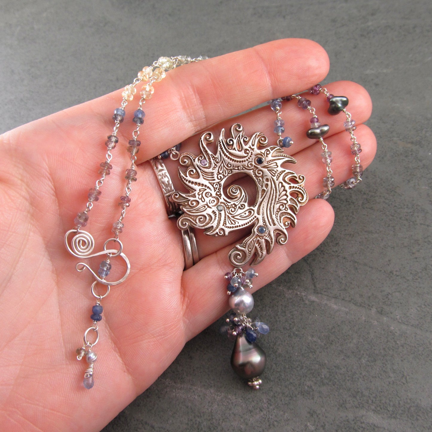 Ocean blue spiral shell fine silver pendant with sapphire and Tahitian and Akoya pearls