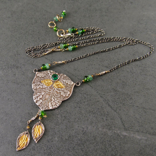 Green man pendant in fine silver with 22k gold accents, emerald and chrome diopside